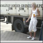Girl is smoking and drinking a beer near Kwaliteit Zonder... car